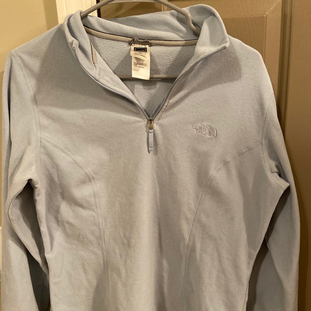 Blue half zip north face jacket